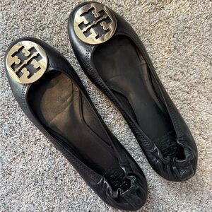 Tory Burch Black Flats with Gold Emblem